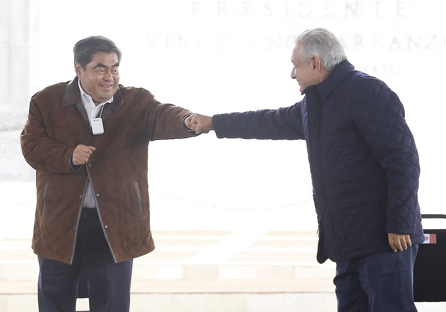El gobernador y el Presidente.