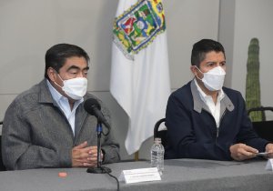 Miguel Barbosa y Eduardo Rivera 